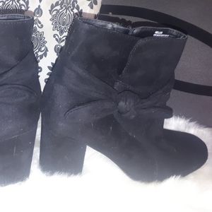 Black booties with a bow